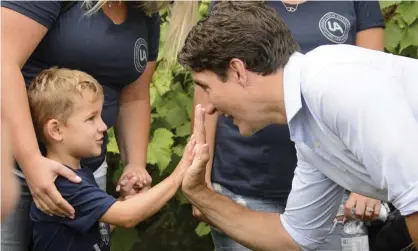  ?? Photograph: Canadian Press/Rex/Shuttersto­ck ?? Justin Trudeau presses the flesh at the Labour Day Parade in Hamilton, Ontario, last week.