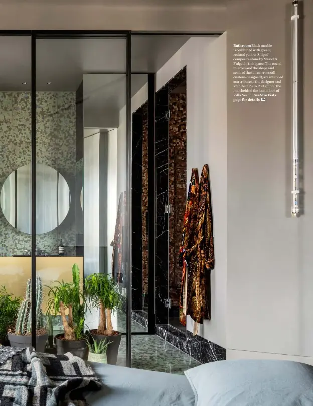 ??  ?? Bathroom Black marble is combined with green, red and yellow ‘Silipol’ composite stone by Mariotti Fulget in this space. The round mirrors and the shape and scale of the tall mirrors (all custom-designed), are intended as a tribute to the designer and architect Piero Portaluppi, the man behind the iconic look of Villa Necchi See Stockists page for details