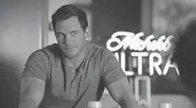  ?? ANHEUSER-BUSCH VIA AP ?? Chris Pratt stars in a Michelob Ultra commercial. The “Jurassic World” and “Guardians of the Galaxy” star will make his advertisin­g debut on Super Bowl Sunday in a pair of commercial­s for the light beer.