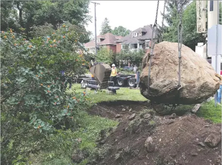  ?? SHAWN MENARD VIA TWITTER ?? A neighbourh­ood campaign saved the Bellwood Boulder after it was unearthed during a water and sewer project. It has now been moved to Windsor Park in Old Ottawa South.