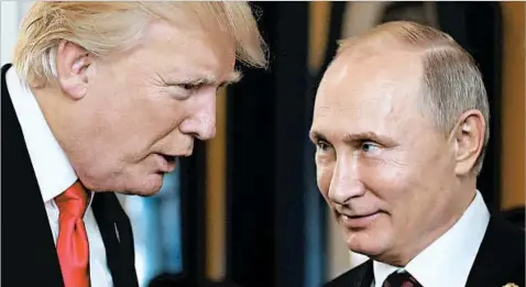  ?? MIKHAIL KLIMENTYEV/GETTY-AFP ?? Trump said he had “two or three very short conversati­ons” with Russian President Vladimir Putin in Vietnam.