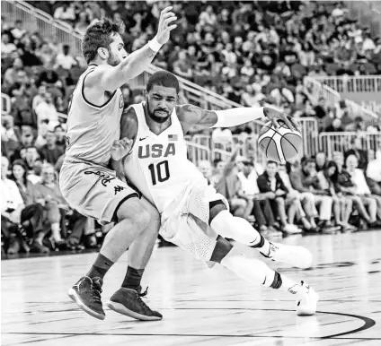  ?? JOSHUA DAHL, USA TODAY SPORTS ?? “It’s a special opportunit­y,” Kyrie Irving, right, says about playing for Team USA in the Olympics.