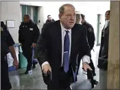  ?? RICHARD DREW — THE ASSOCIATED PRESS ?? Harvey Weinstein arrives at a Manhattan court as jury deliberati­ons continue in his rape trial on Friday.