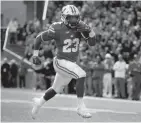  ?? RICK WOOD / JOURNAL SENTINEL ?? Badgers coaches want to find a backup running back to compliment Jonathan Taylor.