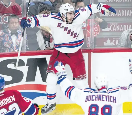  ?? RYAN REMIORZ/THE CANADIAN PRESS ?? New York Rangers centre Mika Zibanejad celebrates after scoring the game-winning goal following overtime period of Game 5 NHL Stanley Cup first round playoff hockey action against the Montreal Canadiens, in Montreal on Thursday.
