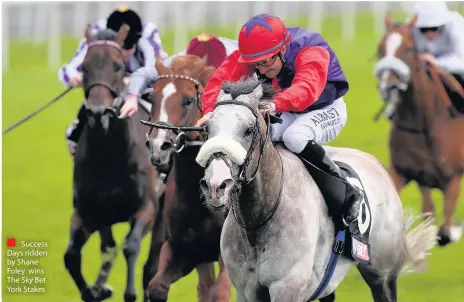  ??  ?? Success Days ridden by Shane Foley wins The Sky Bet York Stakes