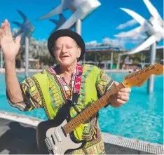  ??  ?? FEELING BLUE: Far North blues legend Ian 'Johno' Johnson, on a visit to the Esplanade Lagoon yesterday, has lost his permission to busk in the city due to alleged ‘slurs’.