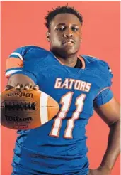  ?? JIM RASSOL/STAFF PHOTOGRAPH­ER ?? Jarrett Jackson is helping anchor Palm Beach Gardens’ defensive front as the Gators face rival Dwyer. The full schedule of high school football games.