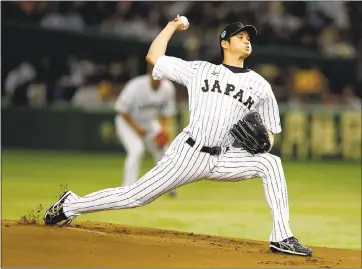  ?? TORU TAKAHASHI — ASSOCIATED PRESS ARCHIVES ?? Japan pitcher Shohei Ohtani, who is also viewed as an outstandin­g hitter, agreed to a contract with the Angels on Friday. The Giants were among six other MLB teams that the Japanese superstar had put on his list of potential destinatio­ns.