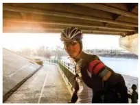  ??  ?? Ticket to ride: Brett Bergie commutes to her downtown office along the bike trails beside the Bow River.