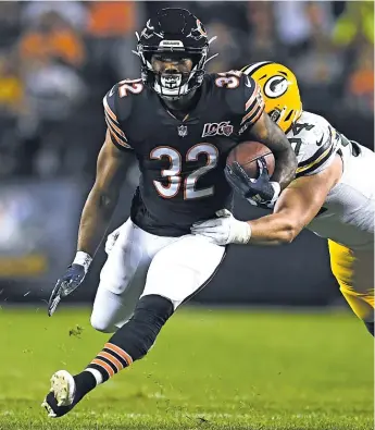  ?? STACY REVERE/GETTY IMAGES ?? If the Bears are wise, running back David Montgomery will get a healthy workload in Green Bay.