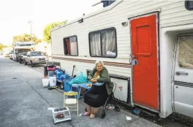  ?? Gabrielle Lurie / The Chronicle 2019 ?? Lorene Ransbottom sits in July outside the RV in Berkeley she was living in. A regionwide count found 161 people were living in RVs in the city last January.