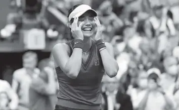  ?? ELISE AMENDOLA AP ?? Britain’s Emma Raducanu, 18, reacts after defeating Leylah Fernandez 6-4, 6-3 in the U.S. Open final. Raducanu is the youngest player to claim a women’s major title since Maria Sharapova was 17 at Wimbledon in 2004.