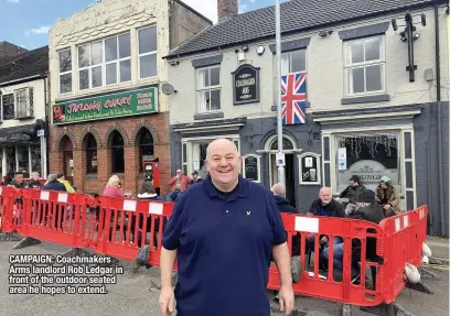  ??  ?? CAMPAIGN: Coachmaker­s Arms landlord Rob Ledgar in front of the outdoor seated area he hopes to extend.