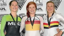  ??  ?? Waimate’s Holly Edmondston, left, with her silver medal at the National Elite Track Cycling Championsh­ips. Kirstie James, centre, won gold and Rushlee Buchanan bronze.