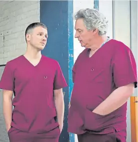  ??  ?? Bob Barrett as Holby’s Dr Sacha Levy, right, with David Ames as Dr Dominic Copeland.