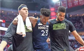  ?? TROY TAORMINA/USA TODAY SPORTS ?? Jimmy Butler’s meniscus injury, which required surgery, could hurt the Timberwolv­es’ playoff chances.