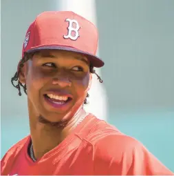  ?? GERALD HERBERT/AP ?? Red Sox pitcher Brayan Bello leaves the field after a workout during spring training in Fort Myers, Fla on Feb. 15.