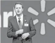  ?? Associated Press file ?? Wal-Mart CEO Doug McMillon told investors: “We need to manage expenses even better.”