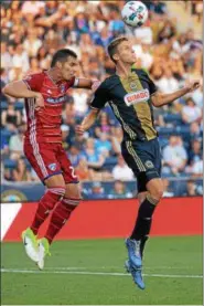  ?? DIGITAL FIRST MEDIA FILE ?? Union defender Jack Elliott, right in this photo from a win over Dallas and Matt Hedges last season, scored two firsthalf goals Friday night as the Union went on to a 3-2 win over New England.