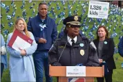  ?? PHOTO BY KAITY ANDREY, MISSION KIDS ?? Dr. Jacqueline Bailey-Davis, chief, Norristown Police Department, speaks at the pinwheel planting ceremony at Norristown Transporta­tion Center, April 5, 2024.