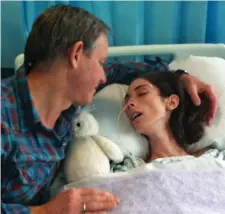  ??  ?? A father’s anguish: A photo released by the family of Nic Hart with Averil two days before she died