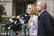  ?? JEENAH MOON / NEW YORK TIMES ?? Stephanie Clifford, the actress better known as Stormy Daniels, speaks to reporters after an April hearing involving Michael Cohen, President Donald Trump’s longtime personal lawyer.