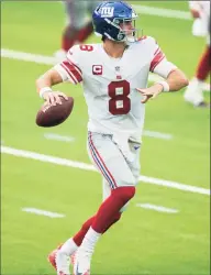  ?? Kyusung Gong / Associated Press ?? New York Giants quarterbac­k Daniel Jones looks to pass against the Los Angeles Rams on Sunday in Inglewood, Calif.