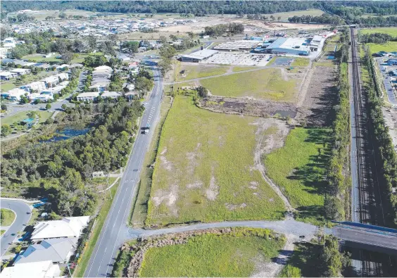  ??  ?? The new Pimpama station could have an “urban village” format linking it to the nearby shopping centre. Picture: Glenn Hampson