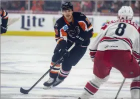  ?? RICK KINTZEL — THE MORNING CALL VIA AP ?? Lehigh Valley Phantoms right winger Nicolas Aube-Kubel (16) moves down the ice as Charlotte Checkers defenseman Philip Samuelsson (8) defends during the first period of Game 1 of the AHL hockey Atlantic Division finals Friday in Allentown, Pa.