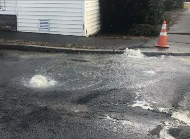  ?? PHOTO PROVIDED ?? A major water main valve broke on in the area of 6Berkley Ave. in Cohoes Friday morning.