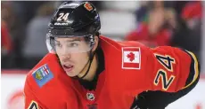  ??  ?? Former Warriors defenceman Travis Hamonic has opted out of the remainder of the NHL season with the Calgary Flames. (NHL.com photo)