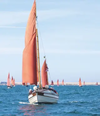  ??  ?? Left Some of the 50-odd Drascombes at the Weymouth rally setting off for Lulworth