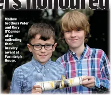  ??  ?? Mallow brothers Peter and Rory O’Connor after collecting their bravery award at Farmleigh House.