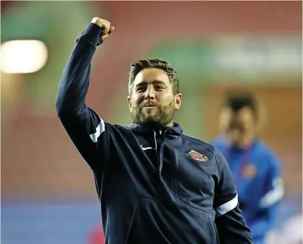  ?? Picture: Jan Kruger/Getty ?? Sunderland boss Lee Johnson celebrates his side’s Carabao Cup win at Wigan