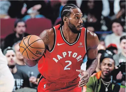 ?? ICON SPORTSWIRE VIA GETTY IMAGES FILE PHOTO ?? The Toronto Raptors, with Kawhi Leonard aboard, begin the regular season on Wednesday at home against the Cleveland Cavaliers.