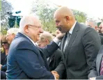  ?? (Mark Neyman/GPO) ?? PRESIDENT REUVEN RIVLIN greets Jordanian Ambassador Walid Obeidat at Independen­ce Day festivitie­s.