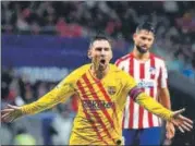  ?? AFP ?? Lionel Messi celebrates after scoring Barcelona’s winner against Atletico Madrid at the Wanda Metropolit­ano stadium on Sunday.