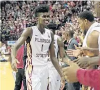  ?? STEVE CANNON/AP ?? Florida State’s Jonathan Isaac, though slight at 6-10, 210 pounds, has been a strong presence for the Seminoles on the boards.