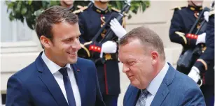  ?? (Philippe Wojaze/Reuters) ?? FRENCH PRESIDENT Emmanuel Macron (left) meets with Denmark’s Prime Minister Lars Lokke Rasmussen at the Elysee Palace in Paris yesterday.