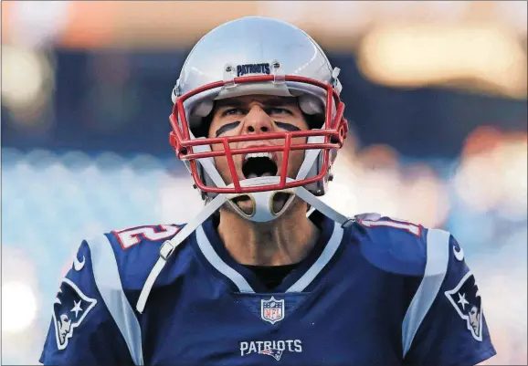  ?? [CHARLES KRUPA/THE ASSOCIATED PRESS] ?? Patriots quarterbac­k Tom Brady gives a shout as he takes the field to warm up before the AFC title game against the Jaguars on Jan. 21 in Foxborough, Mass. The teams battle again Sunday in Jacksonvil­le.