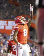  ?? BRAD MCCLENNY AP ?? Florida receiver Trevon Grimes celebrates a touchdown reception against Arkansas last week.