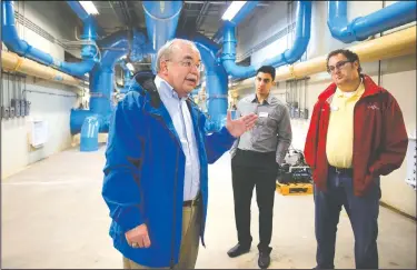  ?? NWA Democrat-Gazette/DAVID GOTTSCHALK ?? Larry Lloyd, chief operating officer with the Beaver Water District, discusses the facility’s operation with members of Leadership Benton County at the “pipe gallery” at the Beaver Water District in Lowell. For photo galleries, go to nwadg.com/photos.