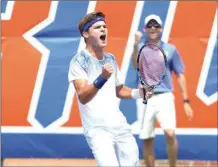  ?? MADISON SCHULTZ / Florida Athletics ?? Florida’s McClain Kessler celebrates after winning his match on Sunday vs. South Florida.