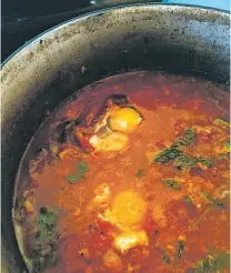  ?? PHOTOS COURTESY MARIANNE SUNDQUIST ?? Poached salmon acquacotta is a versatile Italian soup featuring a host of vegetables, finished with eggs cracked into the pot and served over a piece of toasted bread.