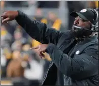  ?? (AP file photos) ?? Mike Tomlin of the Pittsburgh Steelers (above) and Lovie Smith (below) of the Houston Texas are among the five minority head coaches in the NFL. The league announced Monday it has added requiremen­ts on the hiring of offensive assistant coaches and women.