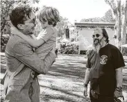  ?? Ken Friedman / Hardly Strictly Bluegrass ?? Justin Townes Earle, left, is shown with father Steve Earle and half-brother John Henry Earle in 2017.