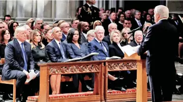  ??  ?? (From left) Trump, Melania, Obama, Michelle, Clinton, Hillary, and Carter listen as former Canadian Prime Minister Brian Mulroney speaks during a State Funeral at the National Cathedral.