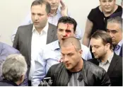  ??  ?? AFP Opposition Social Democrats leader Zoran Zaev is injured in violent clashes in Macedonia's parliament on April 27, 2017.