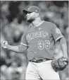  ?? Lindsey Wasson Getty Images ?? YUSMEIRO PETIT is one of many relievers used by Angels, including 12 in one game.